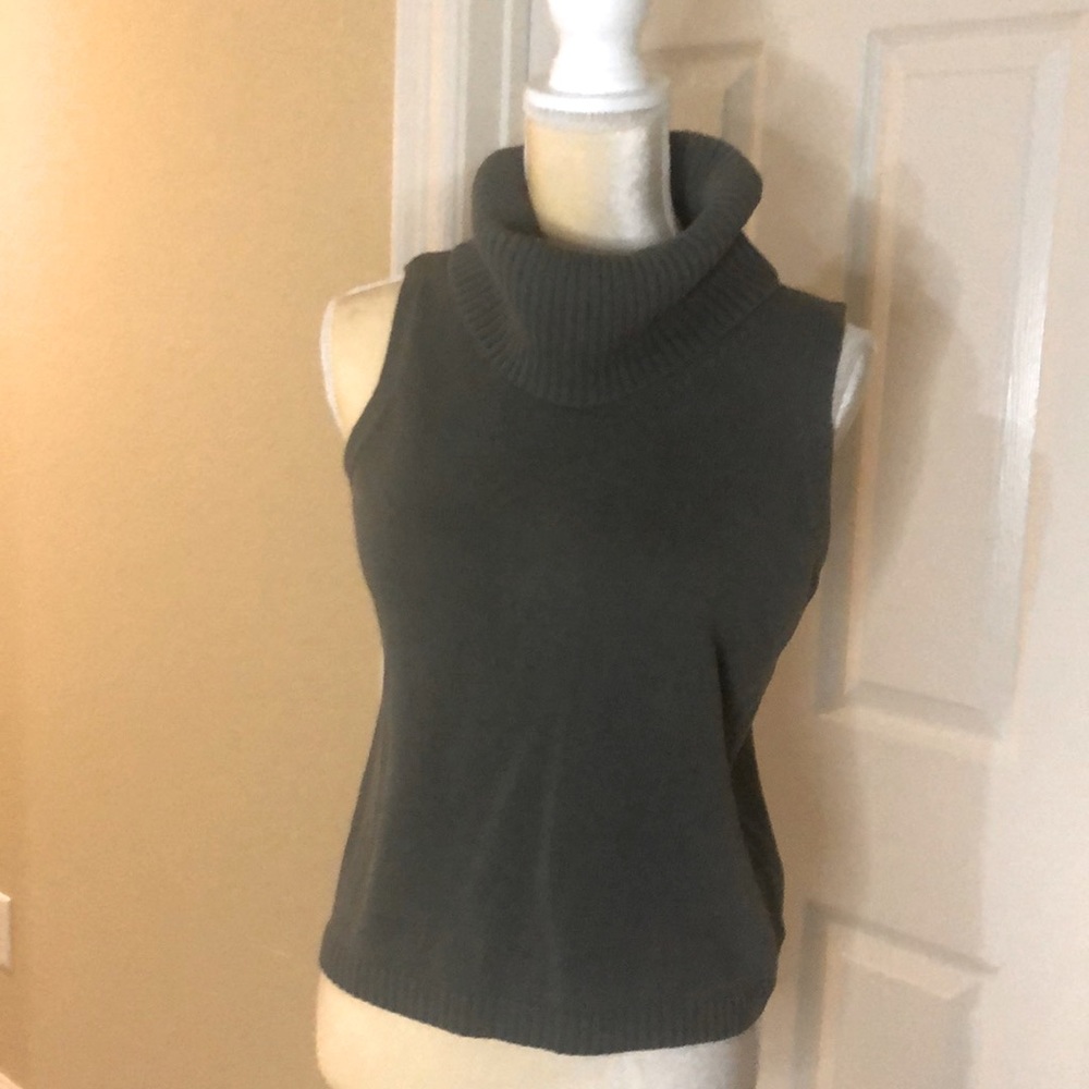 Sleeveless turtleneck by Dana Buchman.